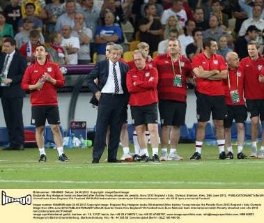 Englands Roy Hodgson looks on dejected after Ashley Young misses his penalty..Euro 2012 England v Italy, Olympic Stadium, Kiev, 24th June 2012. EDITORIAL USE ONLY. No use with unauthorised audio, video, data, fixture lists, club league logos or live services. Online in-match use limited to 120 images, no video emulation. No use in betting, games or single club league player publications.