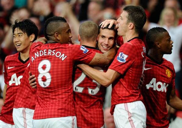 Robin van Persie of Manchester United celebrates scoring his first goal Barclays Premier League; Manchester United (ManU) - Fulham FC at Old Trafford, Manchester on the 25th August 2012. EDITORIAL USE ONLY. No use with unauthorised audio, video, data, fixture lists, club league logos or live services. Online in-match use limited to 120 images, no video emulation. No use in betting, games or single club league player publications.
