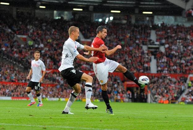 Robin van Persie of Manchester United scores his first goal for Manchester United Barclays Premier League Manchester United v Fulham at Old Trafford, Manchester on the 25th August 2012 Pic Simon Bellis Sportimage EDITORIAL USE ONLY. No use with unauthorised audio, video, data, fixture lists, club league logos or live services. Online in-match use limited to 120 images, no video emulation. No use in betting, games or single club league player publications.