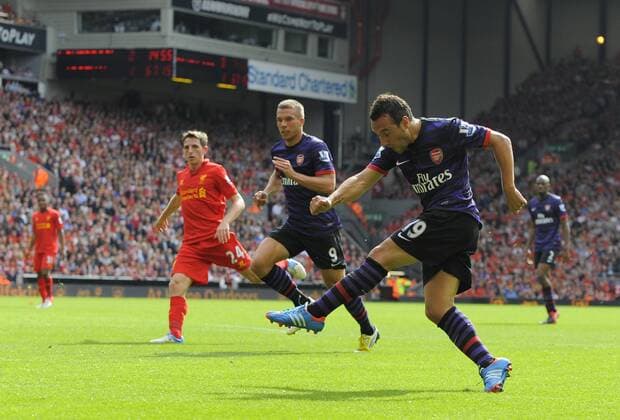 Football - Liverpool v Arsenal - Barclays Premier League - Anfield Stadium - Season 12 13 - 2 9 12 .Santi Cazorla of Arsenal scores the second goal.Mandatory Credit: Simon Bellis Sportimage.EDITORIAL USE ONLY. No use with unaurthorized audio, video, data, fixture lists, club league logos or ?live? services. Online in-match use limited to 45 images, no video emulation. No use in betting, games or single club league player publications. Please contact your account representative for further details... EDITORIAL USE ONLY. No use with unauthorised audio, video, data, fixture lists, club league logos or live services. Online in-match use limited to 120 images, no video emulation. No use in betting, games or single club league player publications.