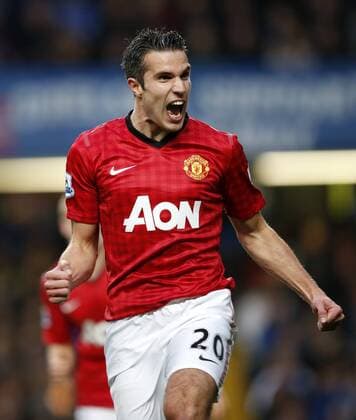 Robin van Persie of Manchester United celebrates scoring during the Barclays Premier League match between Chelsea and Manchester United at Stamford Bridge in London, Britain on October 28, 2012. Manchester United won 3-2. (Xinhua Wang Lili) FOR EDITORIAL USE ONLY. NOT FOR SALE FOR MARKETING OR ADVERTISING CAMPAIGNS. NO USE WITH UNAUTHORIZED AUDIO, VIDEO, DATA, FIXTURE LISTS, CLUB LEAGUE LOGOS OR LIVE SERVICES. ONLINE IN-MATCH USE LIMITED TO 45 IMAGES, NO VIDEO EMULATION. NO USE IN BETTING, GAMES OR SINGLE CLUB LEAGUE PLAYER PUBLICATIONS. BRITAIN-LONDON-SOCCER-PREMIER LEAGUE-CHELSEA-MAN UTD