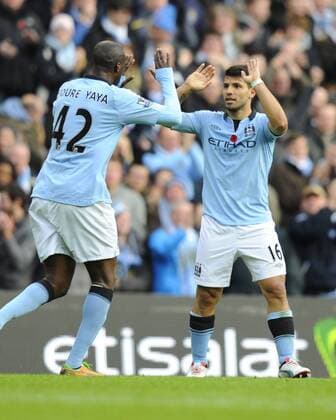 Sergio Kun Aguero of Manchester City celebrates scoring the equalising goal with Yaya Toure of Manchester City - Barclays Premier League - Manchester City vs Tottenham - Etihad Stadium - Manchester - 11 11 12 - Picture Simon Bellis Sportimage EDITORIAL USE ONLY. No use with unauthorised audio, video, data, fixture lists, club league logos or live services. Online in-match use limited to 120 images, no video emulation. No use in betting, games or single club league player publications.
