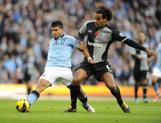 Sergio Kun Aguero of Manchester City tussles with Tom Huddlestone of Tottenham - Barclays Premier League - Manchester City vs Tottenham Hotspur - Etihad Stadium - Manchester - 11 11 12 - EDITORIAL USE ONLY. No use with unauthorised audio, video, data, fixture lists, club league logos or live services. Online in-match use limited to 120 images, no video emulation. No use in betting, games or single club league player publications.