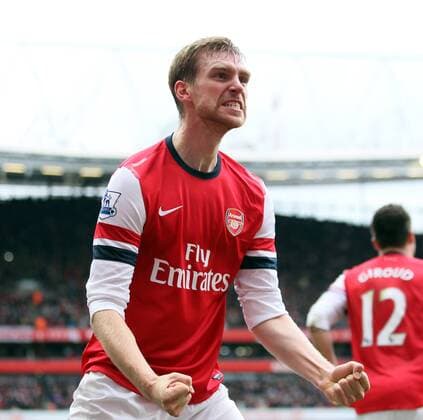 Arsenal s Per Mertesacker celebrates scoring his side opening goal..Arsenal FC London v Tottenham Hotspur - Premier League- Emirates Stadium, London- 17 11 12 - EDITORIAL USE ONLY. No use with unauthorised audio, video, data, fixture lists, club league logos or live services. Online in-match use limited to 120 images, no video emulation. No use in betting, games or single club league player publications.