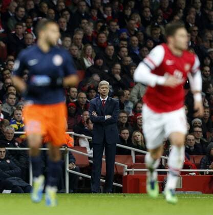 Arsenal s Arsene Wenger looks on . FC Arsenal London v HSC Montpellier -Champions League- Upton Park, London- 21 11 12 - Picture DavidxKlein Sportimage EDITORIAL USE ONLY. No use with unauthorised audio, video, data, fixture lists, club league logos or live services. Online in-match use limited to 120 images, no video emulation. No use in betting, games or single club league player publications.