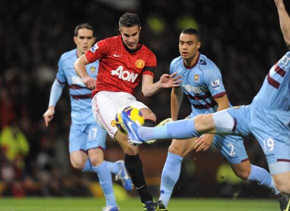 Robin van Persie of Manchester United scores the first goal - Barclays Premier League - Manchester Utd vs West Ham Utd - Old Trafford Stadium - Manchester - 28 11 12 EDITORIAL USE ONLY. No use with unauthorised audio, video, data, fixture lists, club league logos or live services. Online in-match use limited to 120 images, no video emulation. No use in betting, games or single club league player publications.