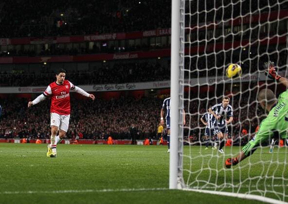 Arsenal s Mikel Arteta scoring his sides second goal from the penalty spot..Arsenal FC London v West Bromwich Albion - Premier League - Emirates Stadium, London- 8 12 12 - Picture David Klein Sportimage EDITORIAL USE ONLY. No use with unauthorised audio, video, data, fixture lists, club league logos or live services. Online in-match use limited to 120 images, no video emulation. No use in betting, games or single club league player publications.