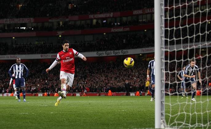 Arsenal s Mikel Arteta scoring his sides second goal from the penalty spot..Arsenal FC London v West Bromwich Albion - Premier League - Emirates Stadium, London- 8 12 12 - Picture David Klein Sportimage EDITORIAL USE ONLY. No use with unauthorised audio, video, data, fixture lists, club league logos or live services. Online in-match use limited to 120 images, no video emulation. No use in betting, games or single club league player publications.