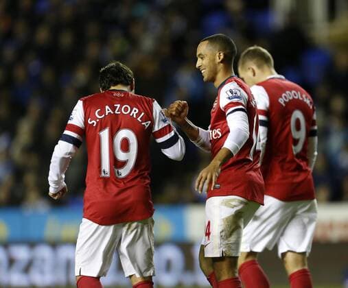 Arsenal s Theo Walcott celebrates scoring his sides fifth goal Reading v Arsenal - Premier League - Madejski Stadium, Reading- 17 12 12 - Picture David Klein Sportimage EDITORIAL USE ONLY. No use with unauthorised audio, video, data, fixture lists, club league logos or live services. Online in-match use limited to 120 images, no video emulation. No use in betting, games or single club league player publications.