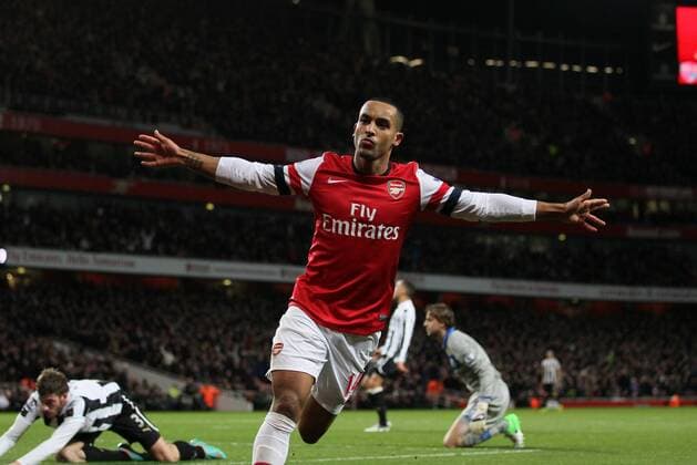 Arsenal s Theo Walcott celebrates scoring his sides opening goal..- Arsenal v Newcastle United - Barclays Premier League - the Emirates Stadium, London- 29 12 12 - Picture David Klein Sportimage EDITORIAL USE ONLY. No use with unauthorised audio, video, data, fixture lists, club league logos or live services. Online in-match use limited to 120 images, no video emulation. No use in betting, games or single club league player publications.