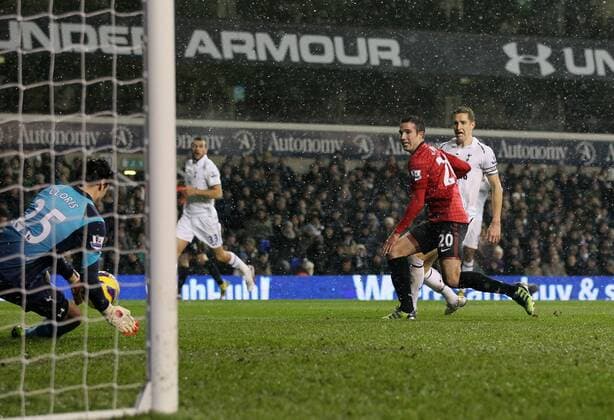 Tottenham s Hugo Lloris saves from Manchester United ManU s Robin Van Persie..Tottenham Hotspur v Manchester United ManU - Barclays Premier League - White Hart Lane, London- 20 01 13 - Picture David Klein Sportimage EDITORIAL USE ONLY. No use with unauthorised audio, video, data, fixture lists, club league logos or live services. Online in-match use limited to 120 images, no video emulation. No use in betting, games or single club league player publications.
