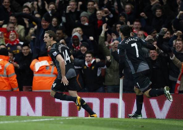 Liverpool s Jordan Henderson celebrates scoring his sides second goal.. - FC Arsenal vs FC Liverpool - Barclays Premier League - Emirates Stadium, London- 30 01 13 - EDITORIAL USE ONLY. No use with unauthorised audio, video, data, fixture lists, club league logos or live services. Online in-match use limited to 120 images, no video emulation. No use in betting, games or single club league player publications.