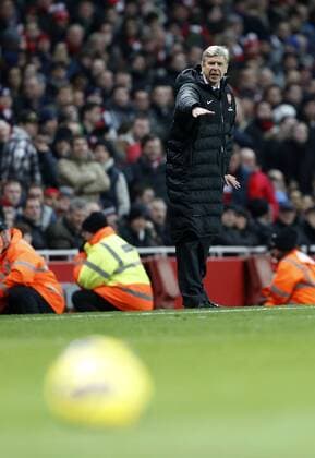 Arsenal s Arsene Wenger looks on .. - FC Arsenal vs FC Liverpool - Barclays Premier League - Emirates Stadium, London- 30 01 13 - EDITORIAL USE ONLY. No use with unauthorised audio, video, data, fixture lists, club league logos or live services. Online in-match use limited to 120 images, no video emulation. No use in betting, games or single club league player publications.