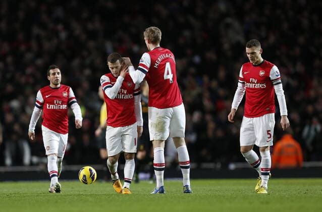 Arsenal s Jack Wilshere looks on dejected .. - FC Arsenal vs FC Liverpool - Barclays Premier League - Emirates Stadium, London- 30 01 13 - EDITORIAL USE ONLY. No use with unauthorised audio, video, data, fixture lists, club league logos or live services. Online in-match use limited to 120 images, no video emulation. No use in betting, games or single club league player publications.