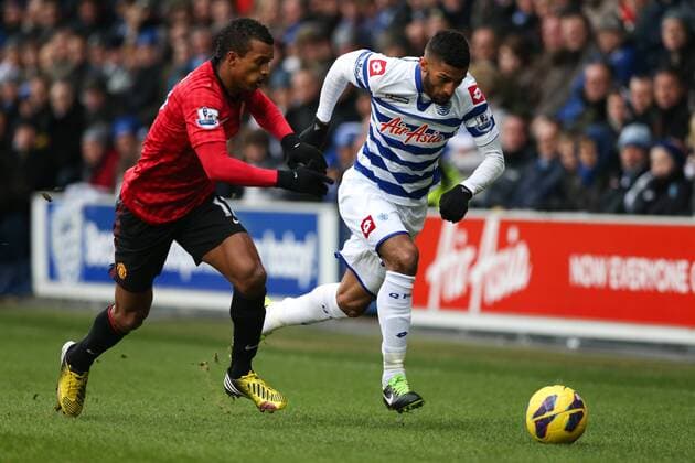 Football - 2012 2013 Premier League - Queens Park Rangers vs. Manchester United (ManU) Armand Traore of Queens Park Rangers and Manchester United (ManU) s Nani at Loftus Road, London