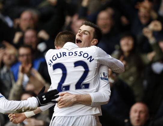 Tottenham s Gareth Bale celebrates scoring his sides opening goal..Tottenham Hotspur v Arsenal- Barclays Premier League - White Hart Lane, London- 3 03 13 - Picture David Klein Sportimage EDITORIAL USE ONLY. No use with unauthorised audio, video, data, fixture lists, club league logos or live services. Online in-match use limited to 120 images, no video emulation. No use in betting, games or single club league player publications.