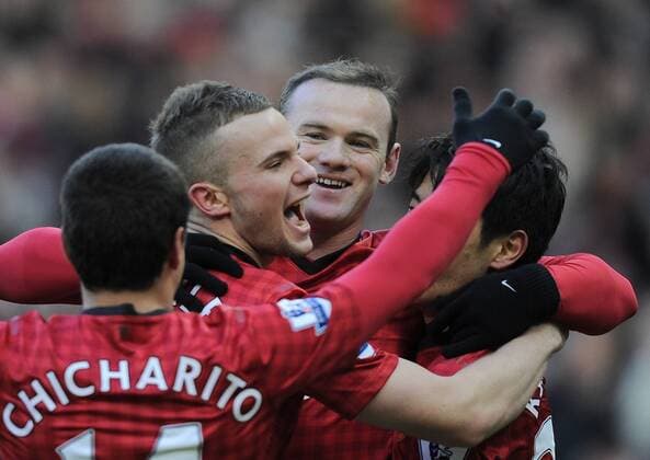 Wayne Rooney of Manchester United celebrates his goal with Tom Cleverley of Manchester United - FA Cup quarter-final - Manchester Utd vs Chelsea - Old Trafford Stadium - 10th March 2013 - Pic Simon Bellis Sportimage EDITORIAL USE ONLY. No use with unauthorised audio, video, data, fixture lists, club league logos or live services. Online in-match use limited to 120 images, no video emulation. No use in betting, games or single club league player publications.