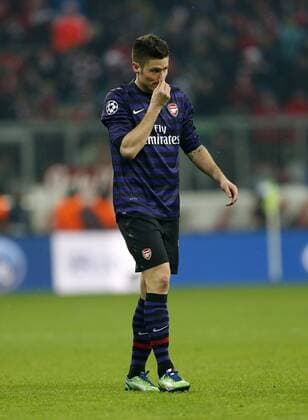 Arsenal s Olivier Giroud looks on dejected..Bayern Munich v Arsenal- UEFA Champions League - Second Round, Second Leg - Allianz Arena, Munich- 13 03 13 - Picture David Klein Sportimage EDITORIAL USE ONLY. No use with unauthorised audio, video, data, fixture lists, club league logos or live services. Online in-match use limited to 120 images, no video emulation. No use in betting, games or single club league player publications.