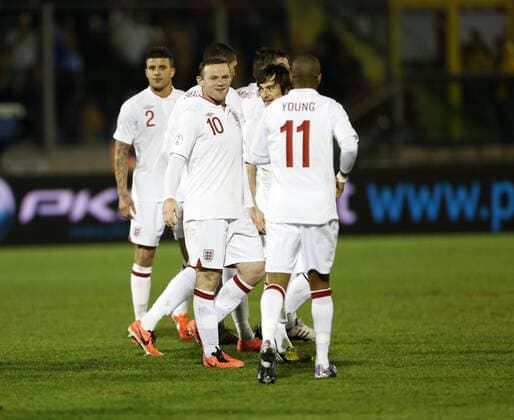 England s Wayne Rooney celebrates scoring his sides sixth goal..San Marino v England- World Cup Qualifier - Stadio di Serravalle, Serravalle- 22 03 13 - Picture David Klein Sportimage EDITORIAL USE ONLY. No use with unauthorised audio, video, data, fixture lists, club league logos or live services. Online in-match use limited to 120 images, no video emulation. No use in betting, games or single club league player publications.