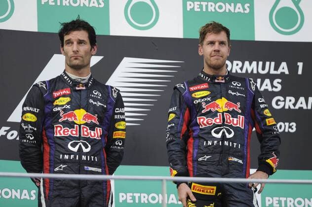 v.li:Mark WEBBER (AUS),Red Bull Racing geht auf Distanz zu Sebastian VETTEL (GER),Red Bull Racing,wenig Begeisterung,Missstimmung,Enttaeuschung,Frust,enttaeuscht,frustriert,niedergeschlagen,bei der Siegerehrung,Aktion. Formel 1, GP von Malaysia Kuala Lumpur,Sepang Circuit,Rennen, Saison2013,am 24.03.2013.