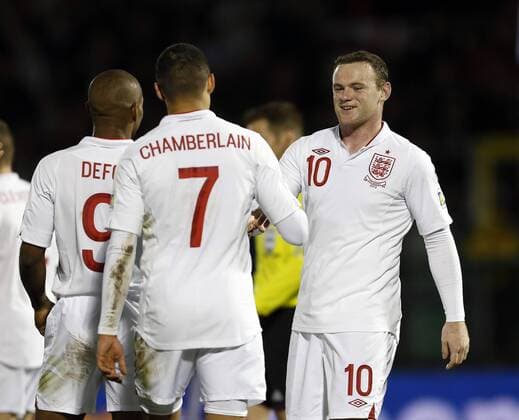 England s Wayne Rooney celebrates scoring his sides sixth goal..San Marino v England- World Cup Qualifier - Stadio di Serravalle, Serravalle- 22 03 13 - Picture David Klein Sportimage EDITORIAL USE ONLY. No use with unauthorised audio, video, data, fixture lists, club league logos or live services. Online in-match use limited to 120 images, no video emulation. No use in betting, games or single club league player publications.