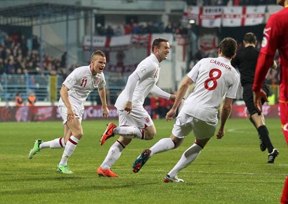 England s Wayne Rooney celebrates scoring his sides opening goal..Montenegro v England- World Cup Qualifier - Podgorica City Stadium, Podgorica- 26 03 13 - Picture David Klein Sportimage EDITORIAL USE ONLY. No use with unauthorised audio, video, data, fixture lists, club league logos or live services. Online in-match use limited to 120 images, no video emulation. No use in betting, games or single club league player publications.