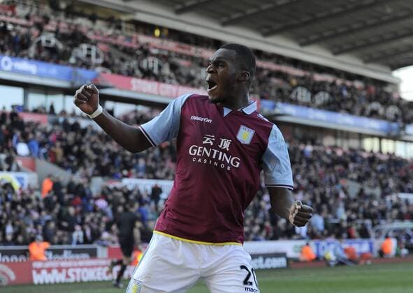 Christian Benteke of Aston Villa celebrates scoring the third goal - Barclays Premier League - Stoke City vs Aston Villa - Britannia Stadium - Stoke on Trent - England - 06 04 13 - Picture Simon Bellis Sportimage EDITORIAL USE ONLY. No use with unauthorised audio, video, data, fixture lists, club league logos or live services. Online in-match use limited to 120 images, no video emulation. No use in betting, games or single club league player publications.