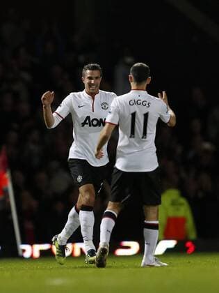 Manchester United s Robin Van Persie celebrates scoring his sides second goal..West Ham United v Manchester United (ManU) - Barclays Premier League - EDITORIAL USE ONLY. No use with unauthorised audio, video, data, fixture lists, club league logos or live services. Online in-match use limited to 120 images, no video emulation. No use in betting, games or single club league player publications.