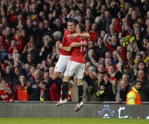 Robin van Persie and Ryan Giggs of Manchester United celebrate the second goal - Barclays Premier League - Manchester Utd ManU vs Aston Villa - Old Trafford Stadium - Manchester - 22 04 13 - EDITORIAL USE ONLY. No use with unauthorised audio, video, data, fixture lists, club league logos or live services. Online in-match use limited to 120 images, no video emulation. No use in betting, games or single club league player publications.