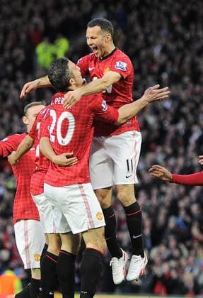 goalscorer Robin van Persie of Manchester United celebrates with the provider Ryan Giggs of Manchester United - Barclays Premier league - Manchester Utd vs Aston Villa - Old Trafford Stadium - Manchester - 22 04 13 - Picture Simon Bellis Sportimage EDITORIAL USE ONLY. No use with unauthorised audio, video, data, fixture lists, club league logos or live services. Online in-match use limited to 120 images, no video emulation. No use in betting, games or single club league player publications.