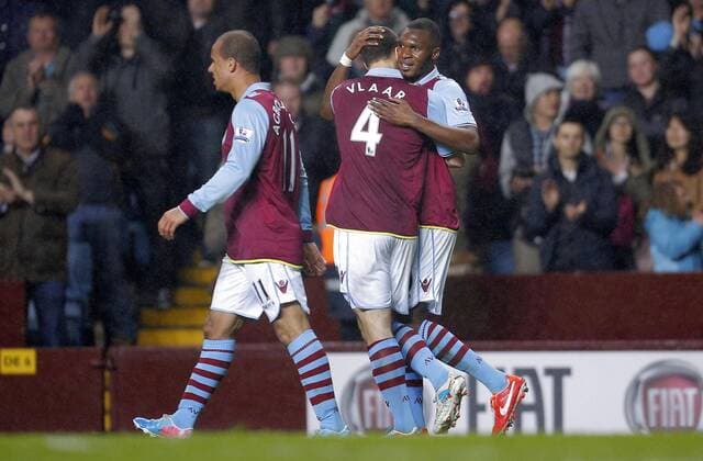 Christian Benteke of Aston Villa celebrates scoring with Ron Vlaar - Barclays Premier League - Aston Villa vs Sunderland - Villa Park Birmingham - Season 12 13 - 29th April 2013 - Picture Malcolm Couzens Sportimage EDITORIAL USE ONLY. No use with unauthorised audio, video, data, fixture lists, club league logos or live services. Online in-match use limited to 120 images, no video emulation. No use in betting, games or single club league player publications.