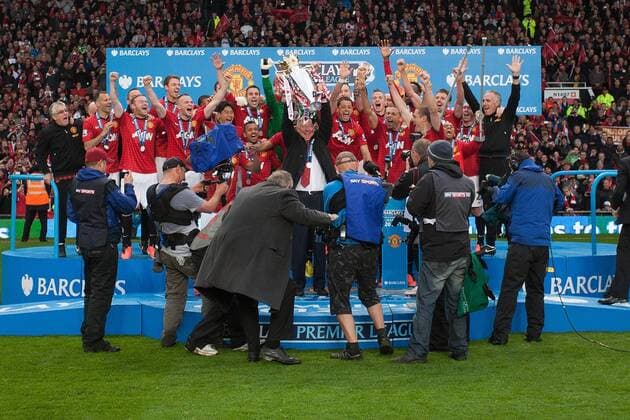 Football - Premier League 2012 2013 - Manchester United - Alex Ferguson, manager of Manchester United leads trophy celebrations at Old Trafford