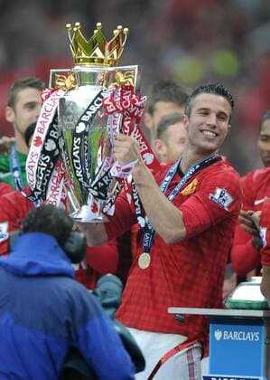 Robin van Persie of Manchester United lifts the Premier League trophy - Barclays Premier League - Manchester United ManU - Old Trafford Stadium - Manchester - England - 12 05 13 - EDITORIAL USE ONLY. No use with unauthorised audio, video, data, fixture lists, club league logos or live services. Online in-match use limited to 120 images, no video emulation. No use in betting, games or single club league player publications.