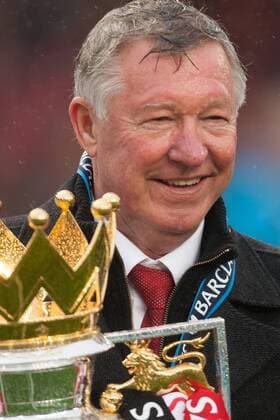 Football - Premier League 2012 2013 - Manchester United ae Alex Ferguson, manager of Manchester United celebrates with the trophy at Old Trafford