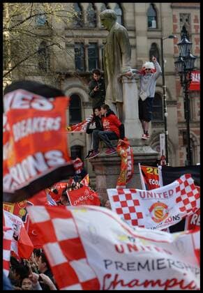 Manchester United Fans wait for Manchester United players to turn up in Albert Square, Manchester, Manchester United celebrate winning their 20th league title winning the Premier League, Monday May 13, 2013. AndrewxParsonsx xi-Images AJP