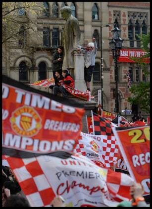 Manchester United Fans wait for Manchester United players to turn up in Albert Square, Manchester, Manchester United celebrate winning their 20th league title winning the Premier League, Monday May 13, 2013. AndrewxParsonsx xi-Images AJP