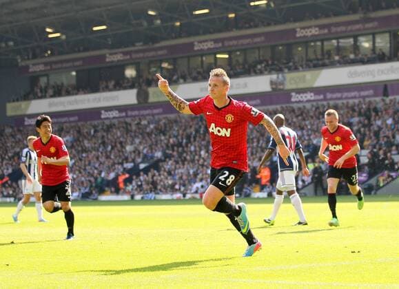 Manchester United s Alex Buttner celebrates scoring his sides third goal - Barclays Premier League - West Bromwich Albion vs Manchester United - The Hawthrowns - West Bromwich - 19 05 2013 - Pic David Klein Sportimage EDITORIAL USE ONLY. No use with unauthorised audio, video, data, fixture lists, club league logos or live services. Online in-match use limited to 120 images, no video emulation. No use in betting, games or single club league player publications.