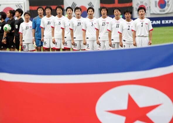 (130721) SEOUL, July 21, 2013. (Xinhua) -- Democratic People s Republic of Korea (DPRK) national football team players pose for photos (L-R) Ra Un Sim, Hong Myong Hui, Kim Un Ha, Kim Un Ju, Kim Un Hyang, Yun Song Mi, Ho Un Byol, Kim Nam Hui, Ri Ye Gyong, Choe Un Ju, Kim Su Gyong before the EAFF Women s Asian Cup 2013 match at the Seoul World Cup Stadium in Seoul, , July 21, 2013. DPRK won the match 2-1. (Xinhua Park Jin hee) (SP) SEOUL-SOCCER-EAFF WOMEN S EAST ASIAN CUP 2013-