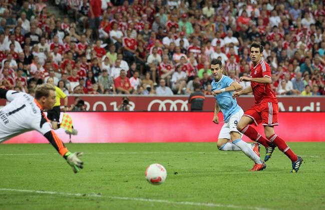Manchester City s Alvaro Negredo scoring his sides opening goal Bayern Munich v Manchester City - Audi Cup - Allianz Arena - Munich - Germany -01 08 2013 - Pic David Klein Sportimage EDITORIAL USE ONLY. No use with unauthorised audio, video, data, fixture lists, club league logos or live services. Online in-match use limited to 120 images, no video emulation. No use in betting, games or single club league player publications.