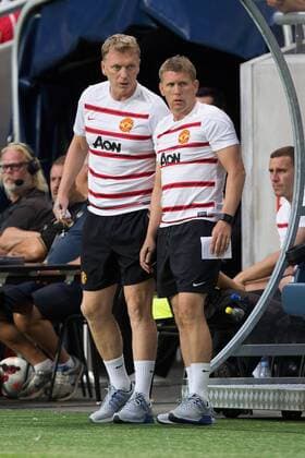 David Moyes, manager of Manchester United watches on alongside assistant Steve Round - AIK Stockholm vs. Manchester United - Friendly - Friends Arena, Stockholm - Sweden - 06 08 2013 Pic Philip Oldham Sportimage EDITORIAL USE ONLY. No use with unauthorised audio, video, data, fixture lists, club league logos or live services. Online in-match use limited to 120 images, no video emulation. No use in betting, games or single club league player publications.