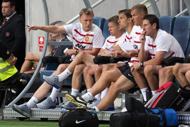 David Moyes, manager of Manchester United watches on from the bench alongside his coaching staff - AIK Stockholm vs. Manchester United - Friendly - Friends Arena, Stockholm - Sweden - 06 08 2013 Pic Philip Oldham Sportimage EDITORIAL USE ONLY. No use with unauthorised audio, video, data, fixture lists, club league logos or live services. Online in-match use limited to 120 images, no video emulation. No use in betting, games or single club league player publications.