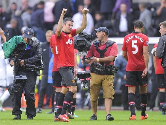Robin van Persie of Manchester United celebrates the win - Barclays Premier League - Swansea City vs Manchester Utd (ManU) - Liberty Stadium - Swansea - Wales - 17 08 13 - EDITORIAL USE ONLY. No use with unauthorised audio, video, data, fixture lists, club league logos or live services. Online in-match use limited to 120 images, no video emulation. No use in betting, games or single club league player publications.