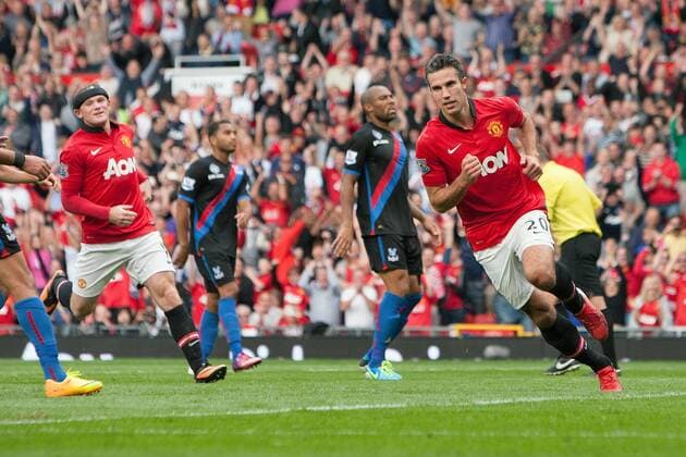 Robin van Persie of Manchester United celebrates his opening goal - Manchester United ManU vs. Crystal Palace - Premier League - Old Trafford - Manchester - 14 09 2013 EDITORIAL USE ONLY. No use with unauthorised audio, video, data, fixture lists, club league logos or live services. Online in-match use limited to 120 images, no video emulation. No use in betting, games or single club league player publications.