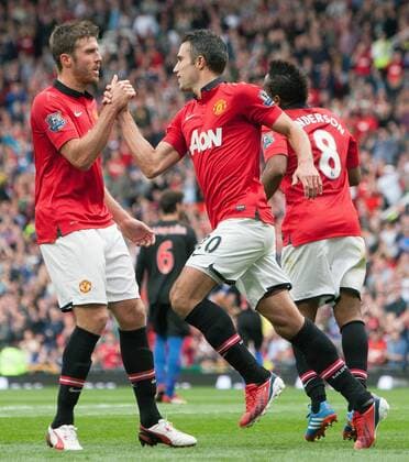 Robin van Persie of Manchester United celebrates his opening goal - Manchester United vs. Crystal Palace - Premier League - Old Trafford - Manchester - 14 09 2013 Pic Philip Oldham Sportimage EDITORIAL USE ONLY. No use with unauthorised audio, video, data, fixture lists, club league logos or live services. Online in-match use limited to 120 images, no video emulation. No use in betting, games or single club league player publications.