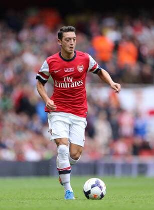 Arsenal s Mesut Ozil in action Arsenal v Stoke - Barclays Premier League- Emirates Stadium - London - England -22 09 2013 - EDITORIAL USE ONLY. No use with unauthorised audio, video, data, fixture lists, club league logos or live services. Online in-match use limited to 120 images, no video emulation. No use in betting, games or single club league player publications.