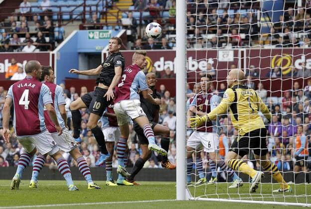 Edin Dzeko heads Manchester City into the lead at 2-1 - Football - Barclays Premier League - Aston Villa vs Manchester City - Villa Park Birmingham - Season 2013-2014 - September 28th 2013 - Photograph Malcolm Couzens Sportimage EDITORIAL USE ONLY. No use with unauthorised audio, video, data, fixture lists, club league logos or live services. Online in-match use limited to 120 images, no video emulation. No use in betting, games or single club league player publications.