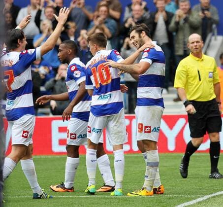 QPR s Charlie Austin celebrates scoring his sides opening goal QPR v Barnsley - Npower Championship - Loftus Road - London - England -05 10 2013 - Pic David Klein Sportimage EDITORIAL USE ONLY. No use with unauthorised audio, video, data, fixture lists, club league logos or live services. Online in-match use limited to 120 images, no video emulation. No use in betting, games or single club league player publications.