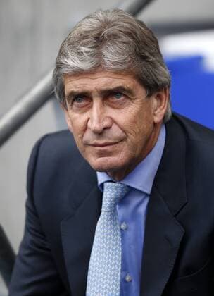 Manuel Pellegrini, manager of Manchester City, looks on ahead of the Barclays Premier League match between Manchester City and Everton at Etihad Stadium in Manchester, Britain on Oct. 5, 2013. Manchester City won 3-1. (Xinhua Wang Lili) FOR EDITORIAL USE ONLY. NOT FOR SALE FOR MARKETING OR ADVERTISING CAMPAIGNS. NO USE WITH UNAUTHORIZED AUDIO, VIDEO, DATA, FIXTURE LISTS, CLUB LEAGUE LOGOS OR LIVE SERVICES. ONLINE IN-MATCH USE LIMITED TO 45 IMAGES, NO VIDEO EMULATION. NO USE IN BETTING, GAMES OR SINGLE CLUB LEAGUE PLAYER PUBLICATIONS. (SP)BRITAIN-MANCHESTER-SOCCER-PREMIER LEAGUE-MAN CITY VS EVERTON