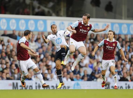 Tottenham s Andros Townsend tussles with West Ham s Kevin Nolan Tottenham Hotspur - West Ham United - Premier League - White Hart Lane - London - England -06 10 2013 - xDavidxKleinx EDITORIAL USE ONLY. No use with unauthorised audio, video, data, fixture lists, club league logos or live services. Online in-match use limited to 120 images, no video emulation. No use in betting, games or single club league player publications.