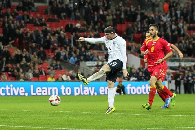 England s Wayne Rooney scoring his sides opening goal England v Montenegro - World Cup Qualifier - London - Wembley - England -11 10 2013 - Pic David Klein Sportimage EDITORIAL USE ONLY. No use with unauthorised audio, video, data, fixture lists, club league logos or live services. Online in-match use limited to 120 images, no video emulation. No use in betting, games or single club league player publications.